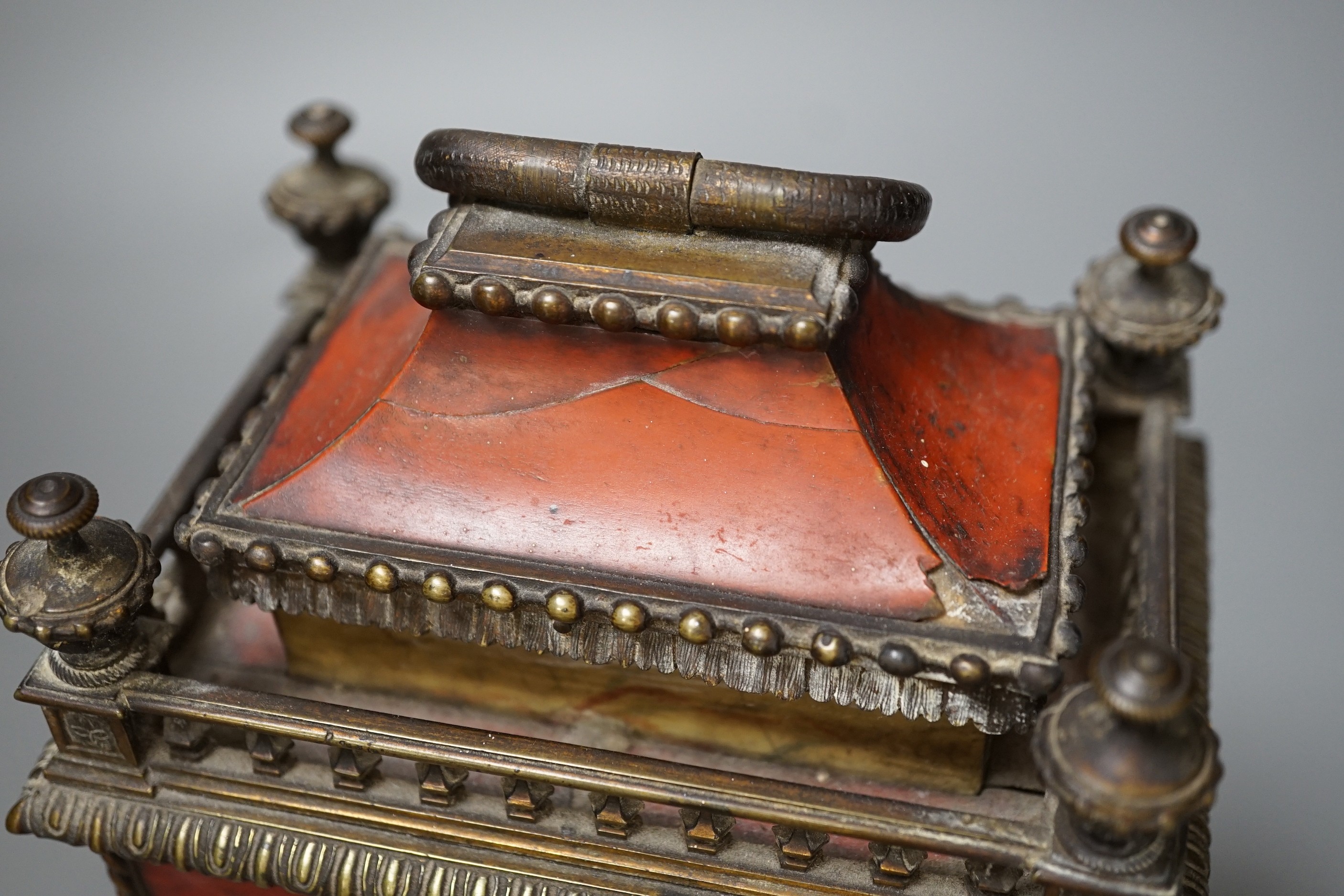 A 19th century French tortoiseshell mantel clock. 24cm high